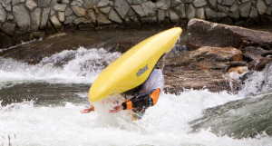 A kayaker does a flip in the Nantahala River, North Carolina. The McLaughlin Whitewater Design Group created the wave-making park and has designed the Sacandaga Whitewater Park. McLaughlin Whitewater Design Group photo