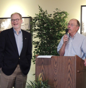 Dr. John Rugge, left, and his colleague Dr. Dan Larson at last Friday’s surprise party.