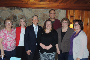 At last week’s party at the Long Horn Restaurant in Lake Luzerne — The honoree Stan Rummel is third from the left. Also in the photo, from left: Mr. Rummel’s wife Susan; his daughter Holly Rummel-Jackson, Karen Cormie, Frank Troelstra, Becky (Addison) Troelstra and Donna Slack. Chronicle photo/Gordon Woodworth