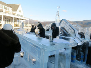 An ice ‘luge’ — Bartenders pour alcohol through a channel in the bottle-shaped sculpture, to create chilled shots. Chronicle photo/Mark Frost