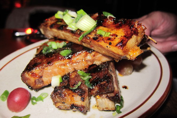 Candied garlic spare ribs, served with frozen grapes. Chronicle photo/Cathy DeDe