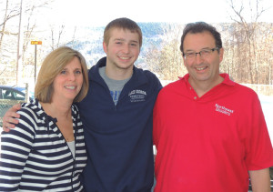 Joel Wincowski with his parents Carol and Joel, at their Lake George home. Chronicle photo/Gordon Woodworth