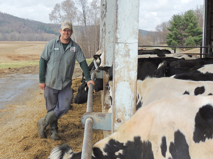 Seth McEachron at the former Skellkill Farms in Jackson that he and his parents bought in March, adding 178 acres, 175 milking cows and room to add more production. Chronicle photo/Gordon Woodworth