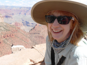 Selfie with condor. Joyce Miller at right, condor on the rock at left.