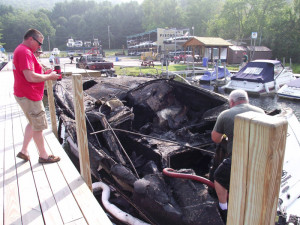 Charred remains of the 28-foot Chaparral boat. Photo by Debbie Fischer