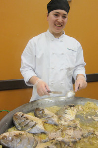 African-inspired dinner was served by aspiring chef John Lam, of the SUNY Adirondack Culinary Arts program. The buffet, based on cuisine of Sierra Leone, on the east coast of Africa, included this Poisson Braise, fresh fish off the bone, with braised onions and lemon thyme. Cathy DeDe photo