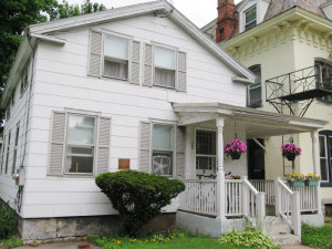 The house where Charles Evans Hughes was born still stands in Glens Falls, though it was moved from Maple Street around the corner to Center Street. A plaque on the front identifies its history. 
