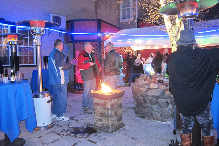 Keep warm — Heaters and a fire pit on the patio at Cirelli’s Osteria in South Glens Falls last year. 