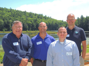 At last week’s Lake George Land Conservancy annual meeting at the Bolton Conservation Club, from left, Jeff Killeen, board chairman of the FUND for Lake George, Dave Wick, executive director of the Lake George Park Commission, Jamie Brown, executive director of the Lake George Land Conservancy and Walt Lender, executive director of the Lake George Association.  Chronicle photo/Gordon Woodworth