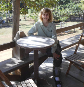 Joyce Miller, on her cottage balcony at the Garden of the Amazon lodge in the Amazon River basin. 