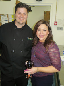 Deric Buck with Rachael Ray. He prepares the meal served after Ms. Ray’s annual scholarship fund-raiser at Lake George High School. Chronicle photo/Mark Frost