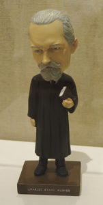 Charles Evans Hughes bobblehead, provided by his law firm, Hughes, Hubbard & Reed, LLP, which continues in New York City.