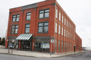 The Joubert & White building on Warren Street as seen when Peter & Suzanne Hoffman were developing their Warren Square project. They exposed the Joubert & White nameplate at the front top of the building that had been hidden. Chronicle file photo/Mark Frost