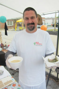 Poblano’s co-owner/chef Mark Brown, at Taste of the North Country, with jalapeno soup and cactus salad. Cathy DeDe photo