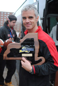 Glens Falls football coach Pat Lilac with the state championship plaque. Photo courtesy of GF City School District